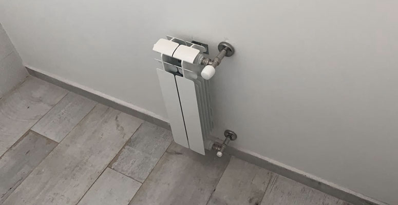 Calefactor fijado a la pared.